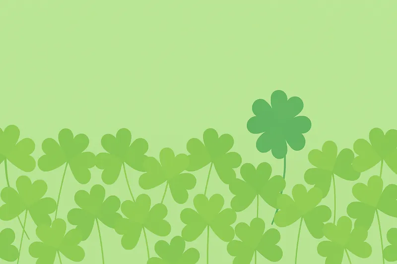 広がる三つ葉の中にたった1つの四つ葉がある構図。希少性を感じる配置。