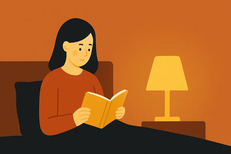 寝る前にブルーライトを避け暖色の灯りで過ごす人物。