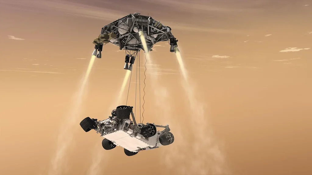 スカイクレーンで火星へ降下する探査車キュリオシティの想像図