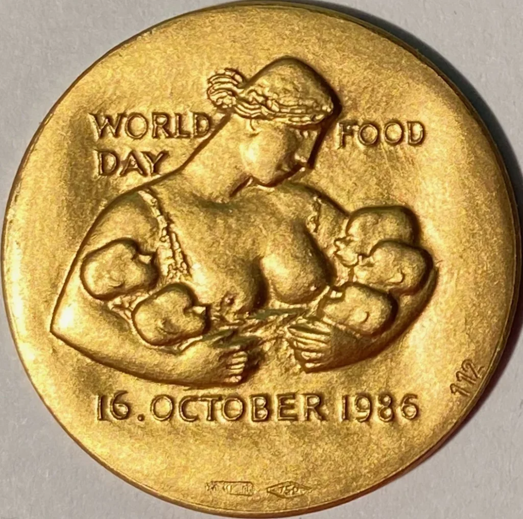 FAOの世界食料デーを記念する1986年の金製メダルの写真