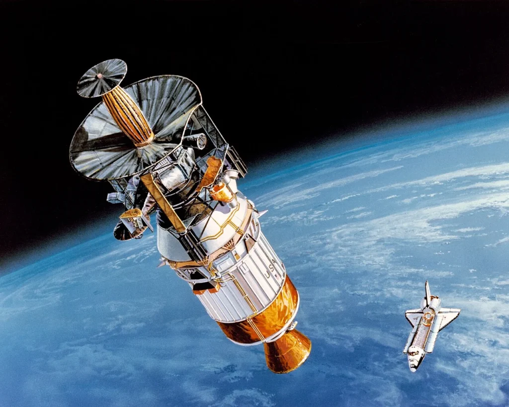 スペースシャトルから木星探査機ガリレオが送り出される様子を描いた想像図