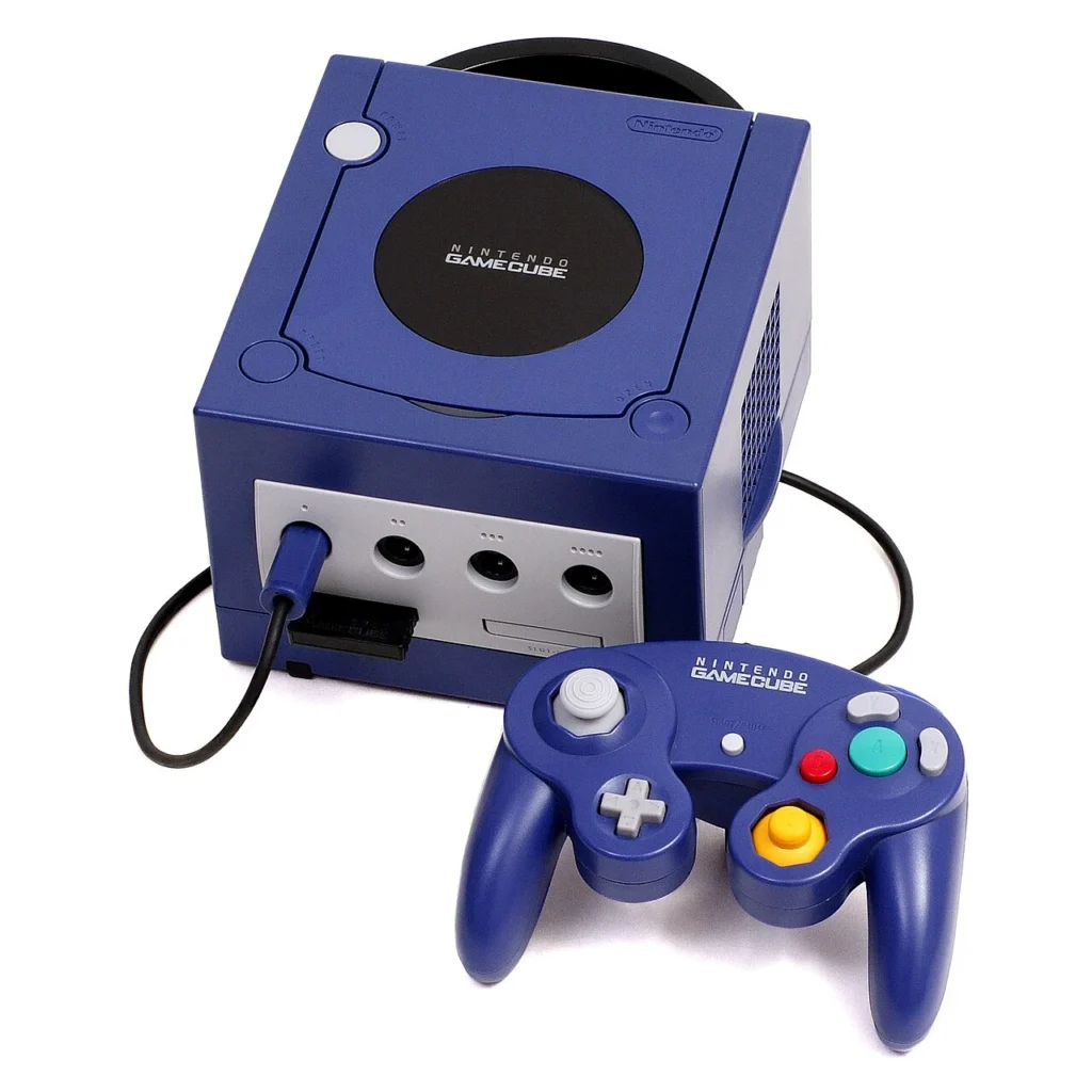 コントローラーとメモリーカードを備えた紫色のゲームキューブの写真
