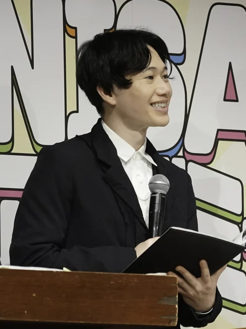 2024年のNISAの日イベントに出演したさんきゅう倉田