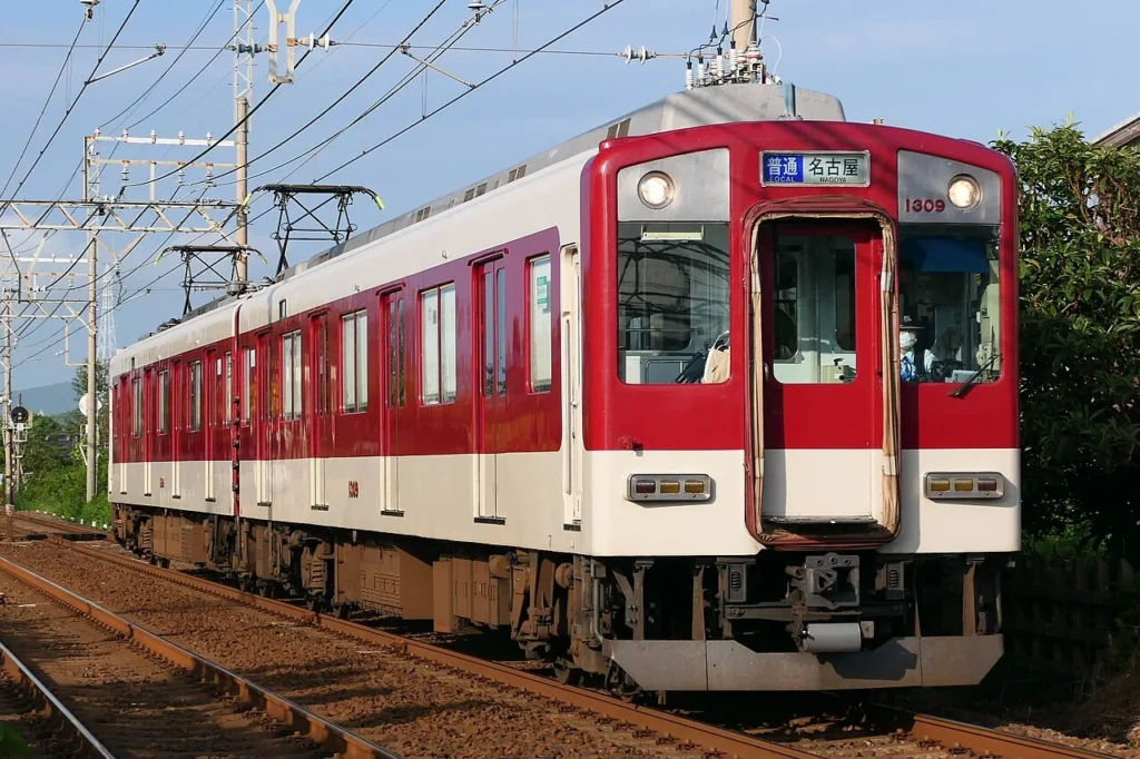 近鉄名古屋線を走る1201系1209編成の普通列車の写真